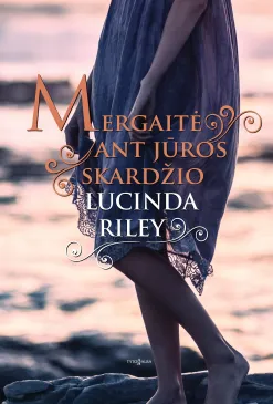 Mergaitė ant jūros skardžio