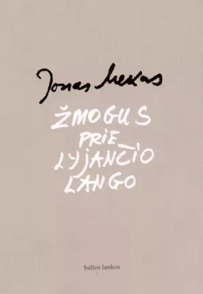 Žmogus prie lyjančio lango