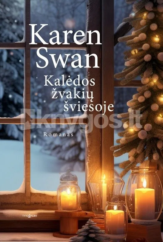 Kalėdos žvakių šviesoje