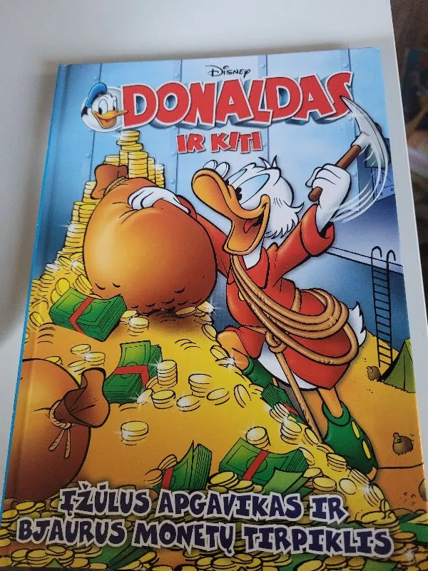 Donaldas ir kiti įžūlus apgavikas ir bjaurus monetų tirpiklis