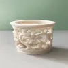 Ažūrinė dramblio kaulo spalvos žvakidė-indelis, 9cm aukštis